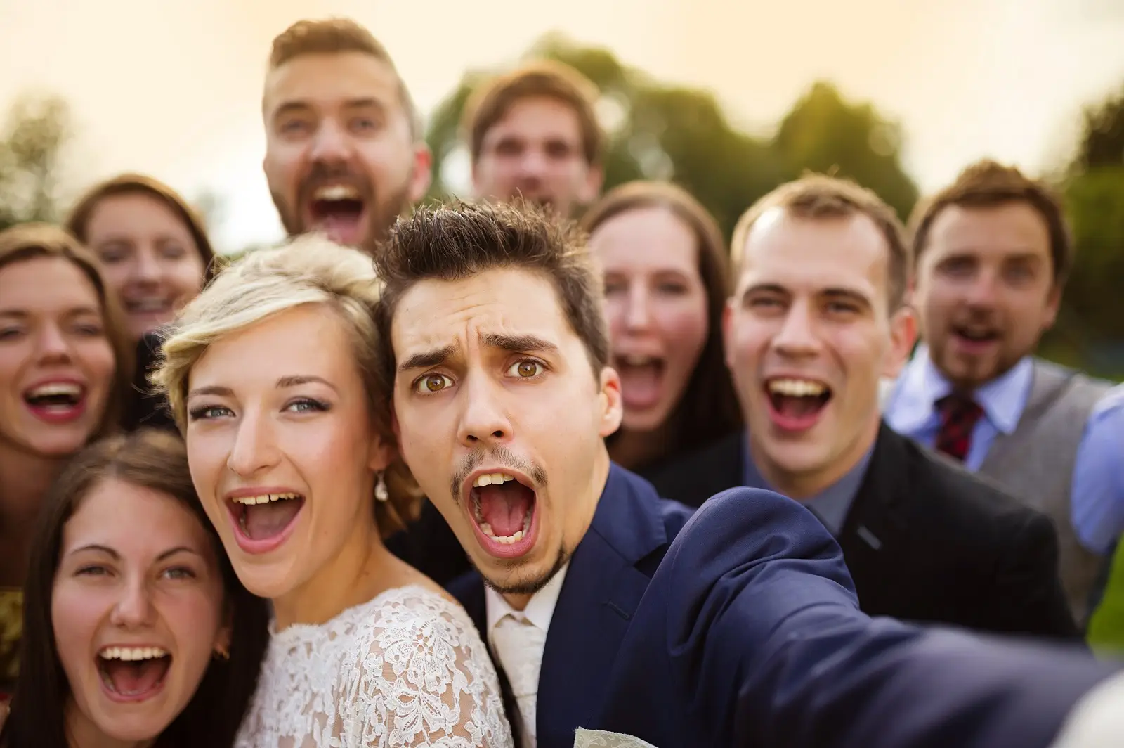 chicago wedding reception with couple and guests taking selfies