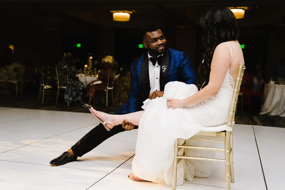 couple on dance floor doing order of dances at wedding reception